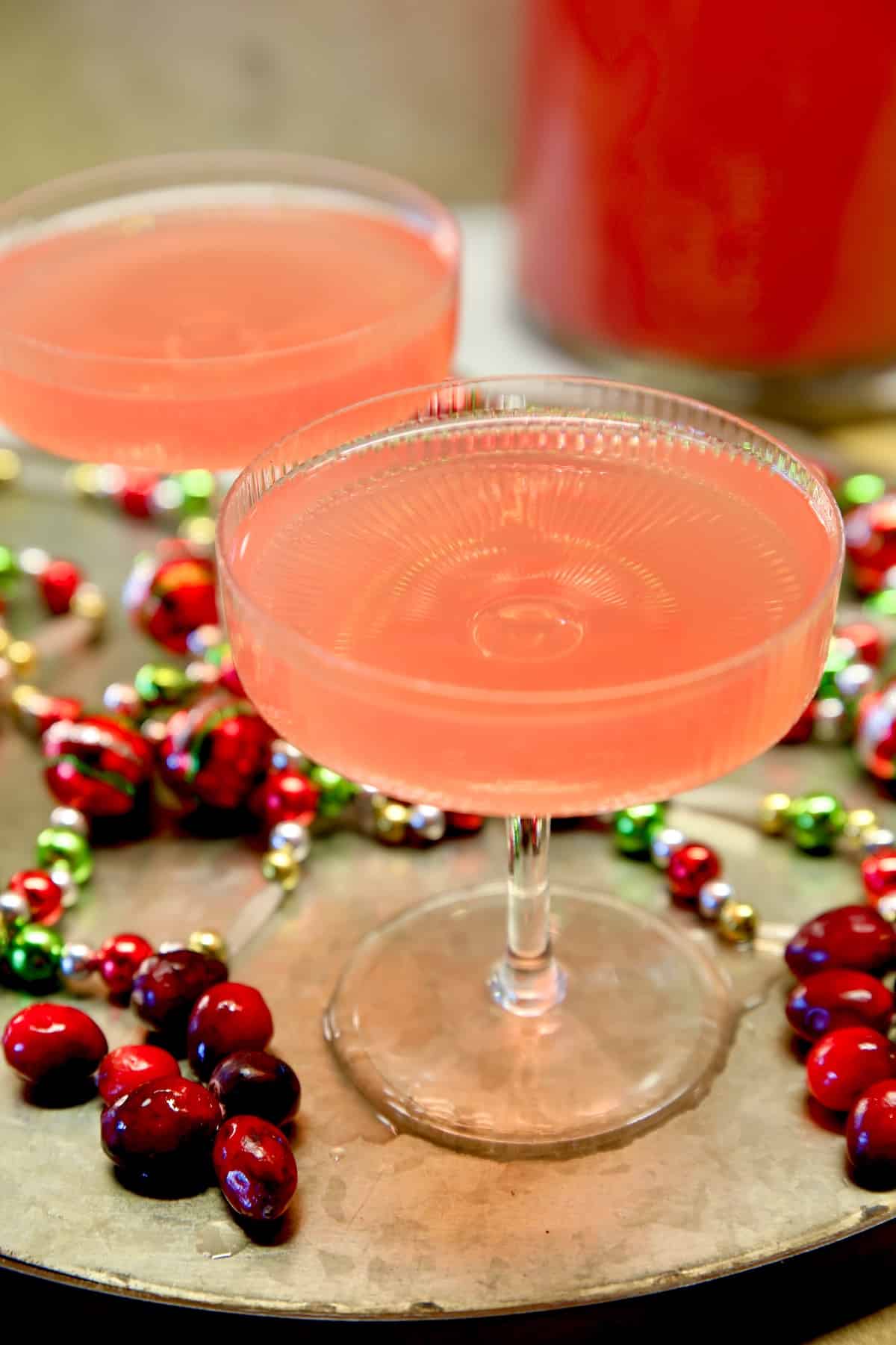 2 coupe glasses of party punch. 