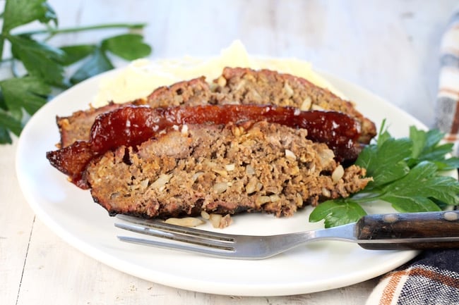 Sliced Smoked Meatloaf with bacon and mashed potatoes 