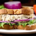 Turkey Salad Sandwich with lettuce and red onion on wheat bread