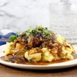 Homemade Salisbury Steak served over Mashed Potatoes