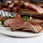 Smoked Baby Back Ribs sliced on a plate