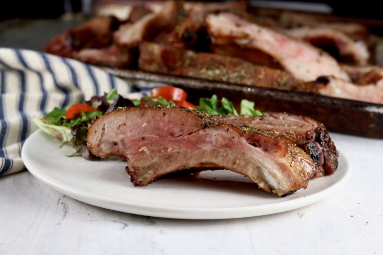 Smoked Baby Back Ribs sliced on a plate