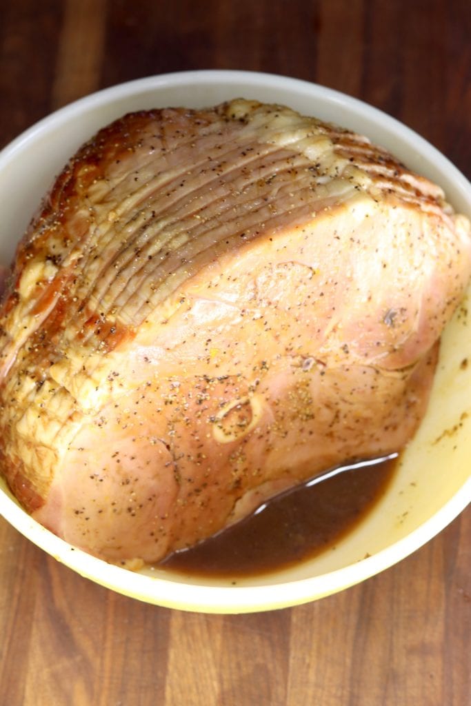 Spiral Sliced Ham in a bowl with balsamic glaze