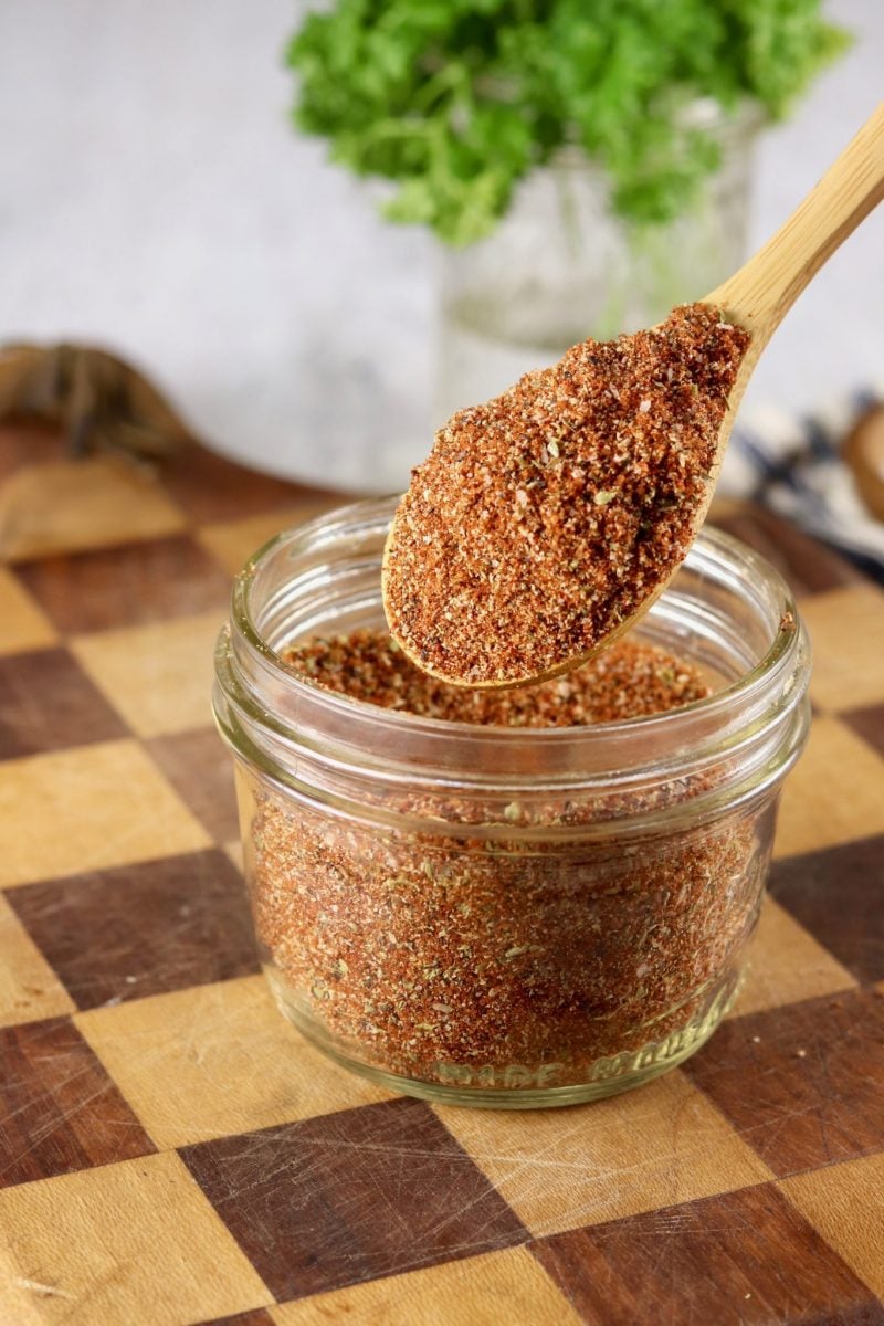 Spoon of Blackened Seasoning Mix in a jar