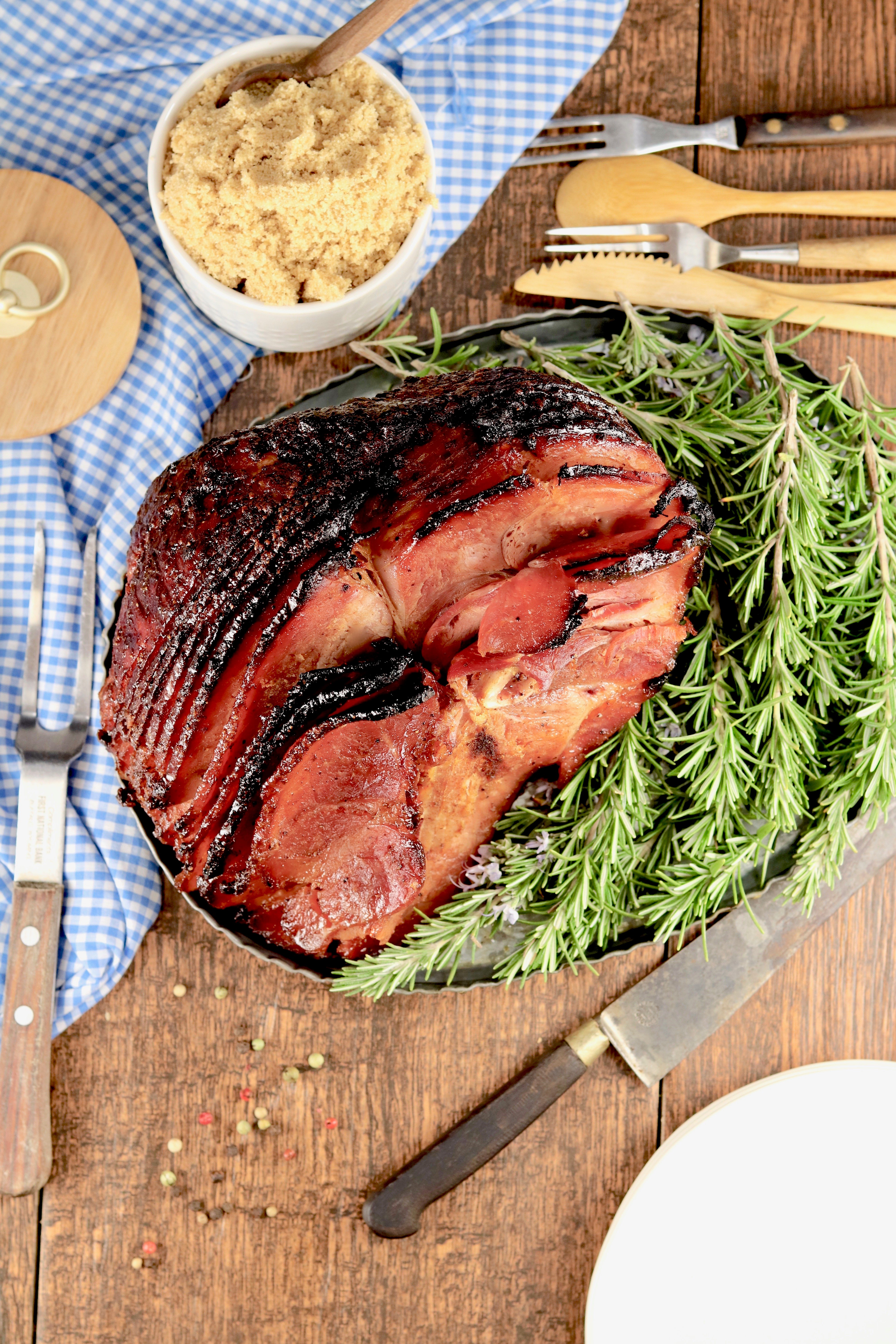 Brown Sugar Glazed Ham garnished from fresh rosemary