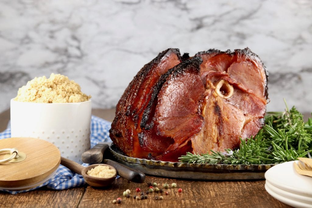 Brown Sugar Glazed Ham with jar of brown sugar