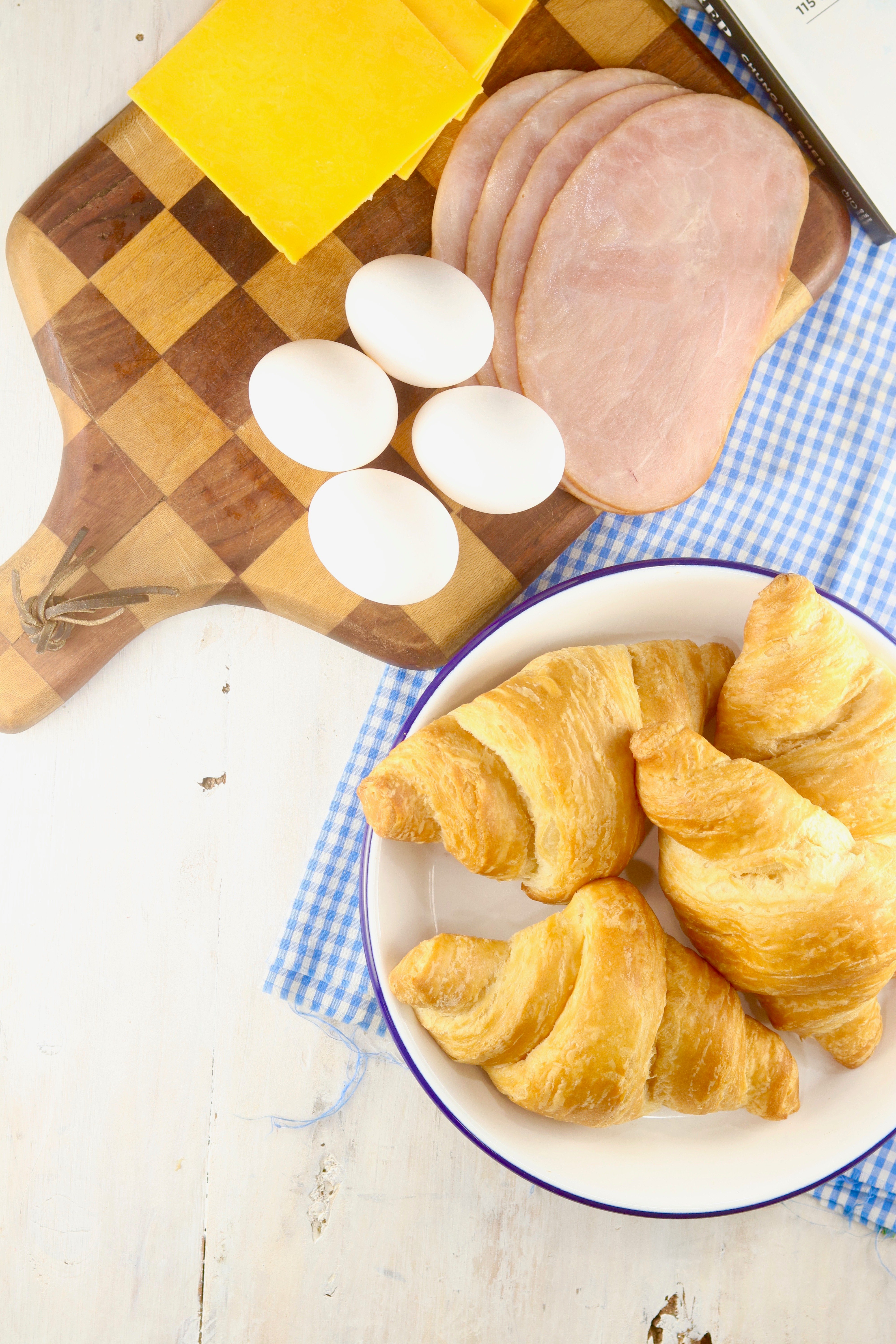 Ingredients for Meal Prep Freezer Breakfast Croissant Sandwiches, ham, eggs, cheese, croissants