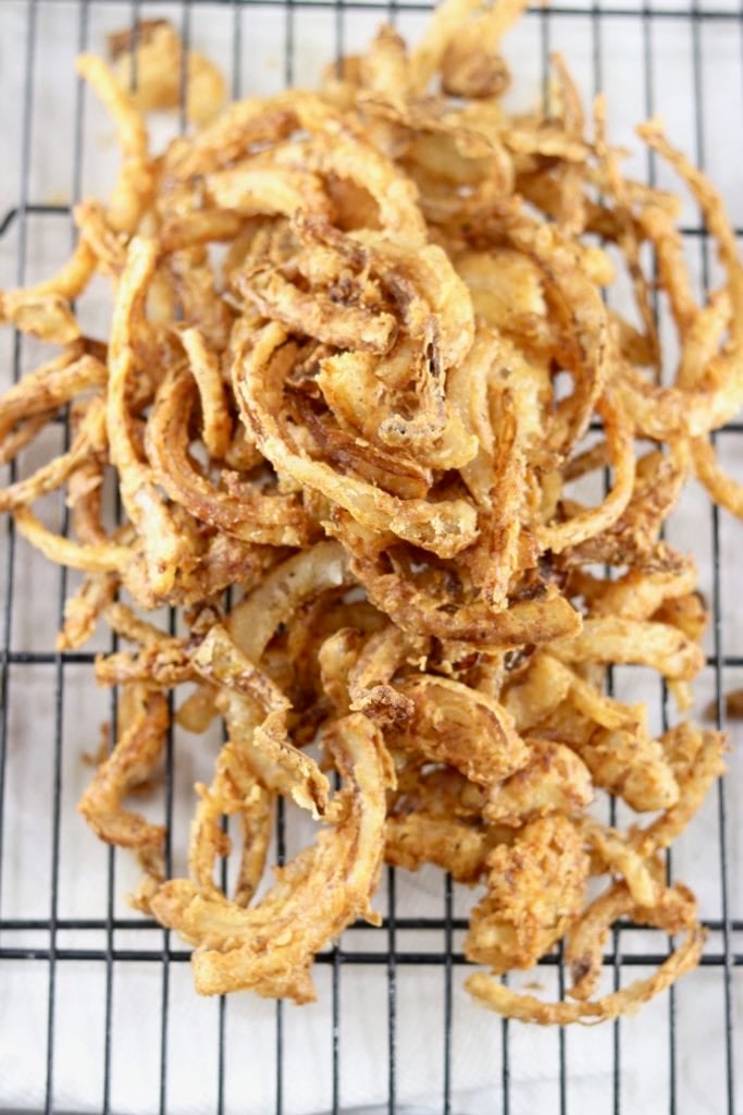 Onion Strings on a wire rack