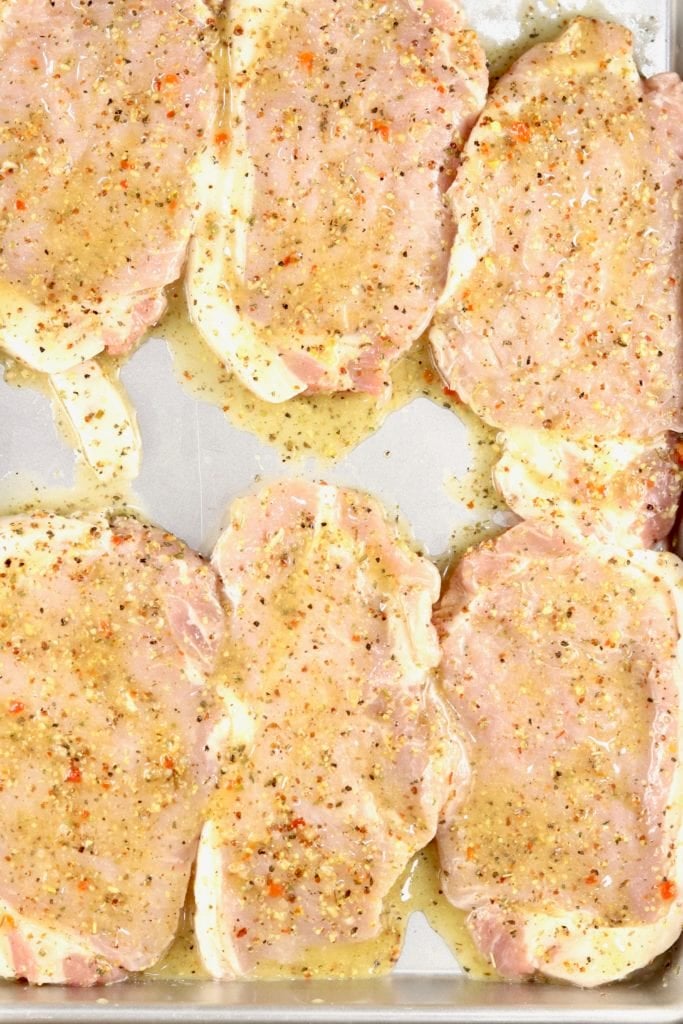 Boneless pork chops coated in zesty Italian dressing 