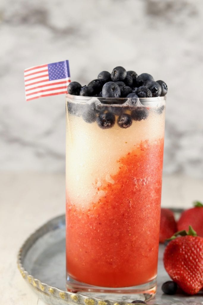 layered Daiquiri with fresh blueberries and American flag pick