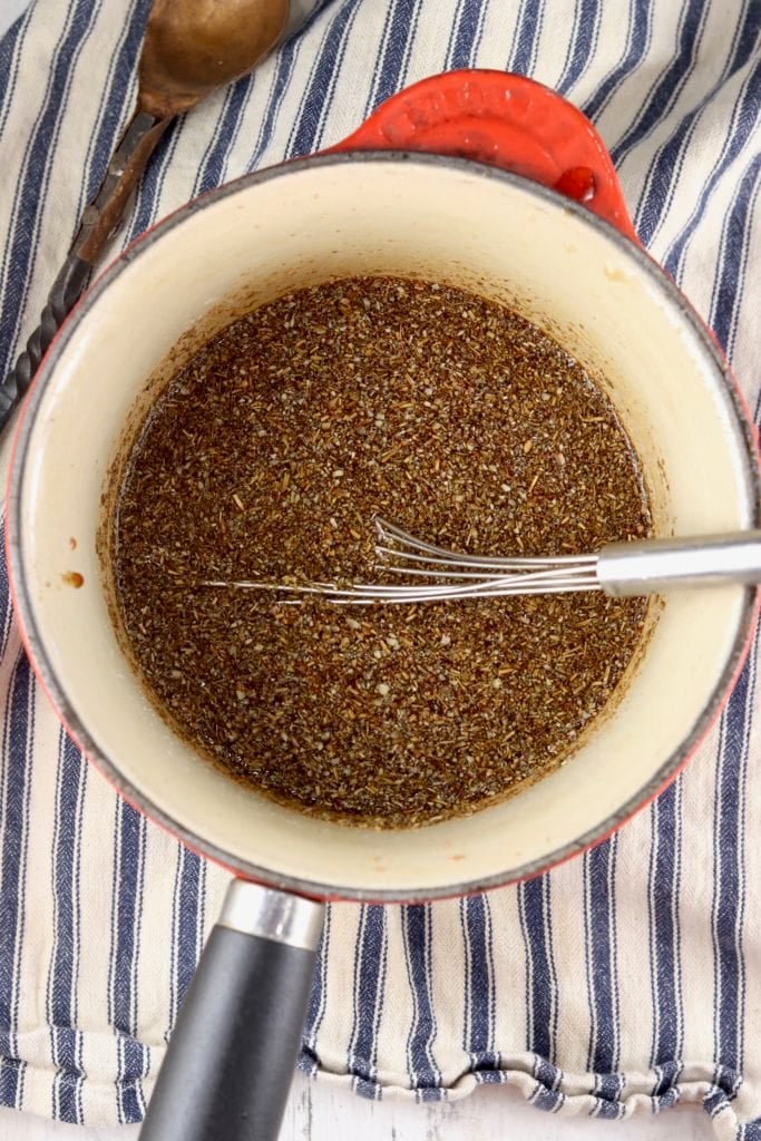 Marinade in a saucepan with Italian seasonings