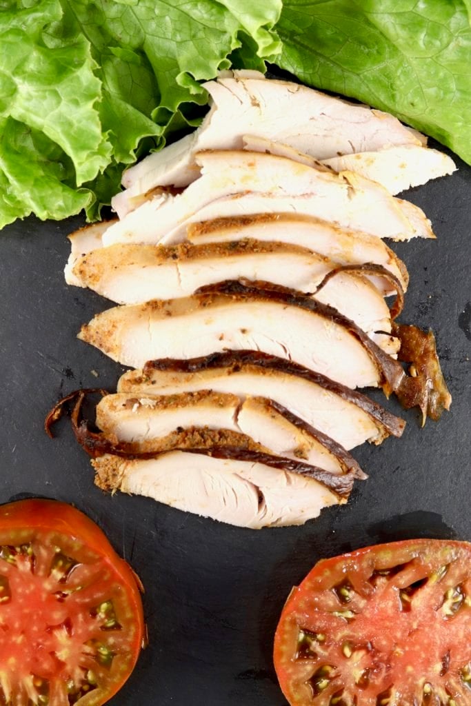 Lettuce, sliced turkey breast and sliced heirloom tomatoes