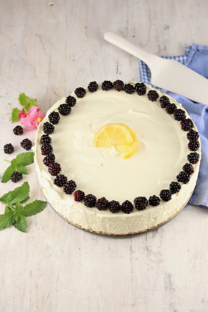 Lemon Chiffon made in a springform pan garnished with blackberries