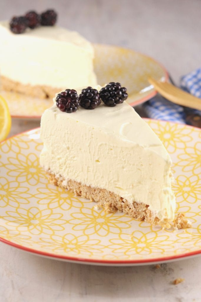 Slices of lemon chiffon dessert on yellow plate