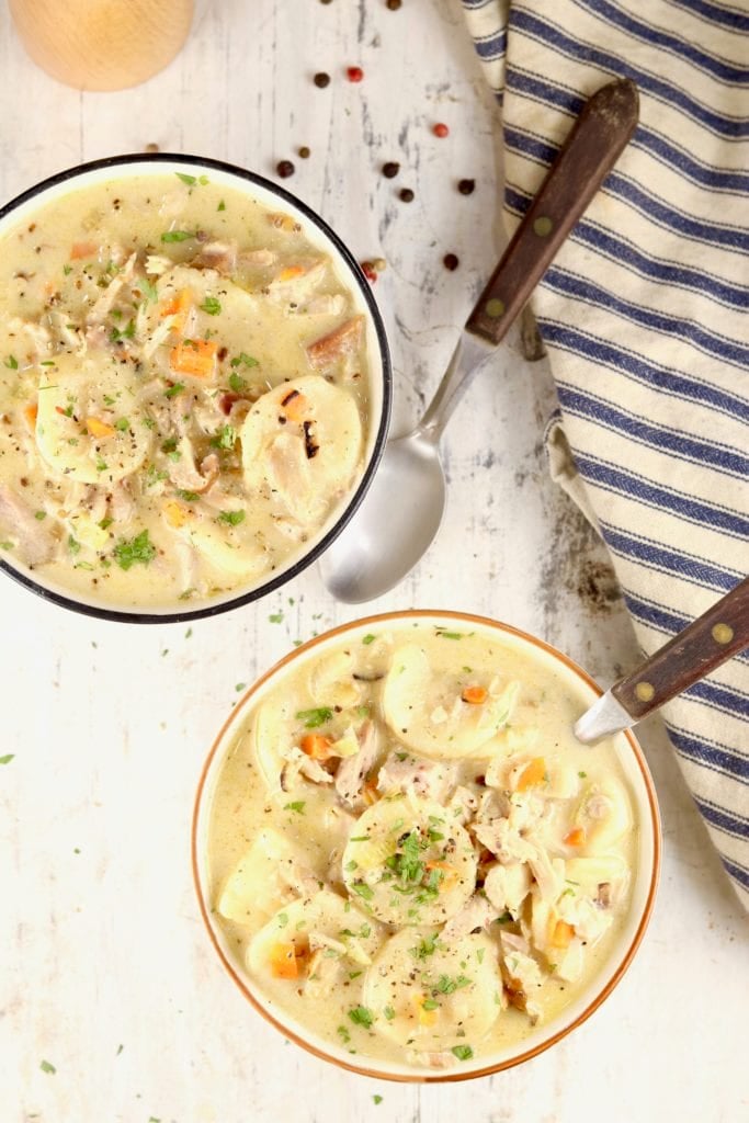 Homemade Dumplings served in bowls with wood handle spoons