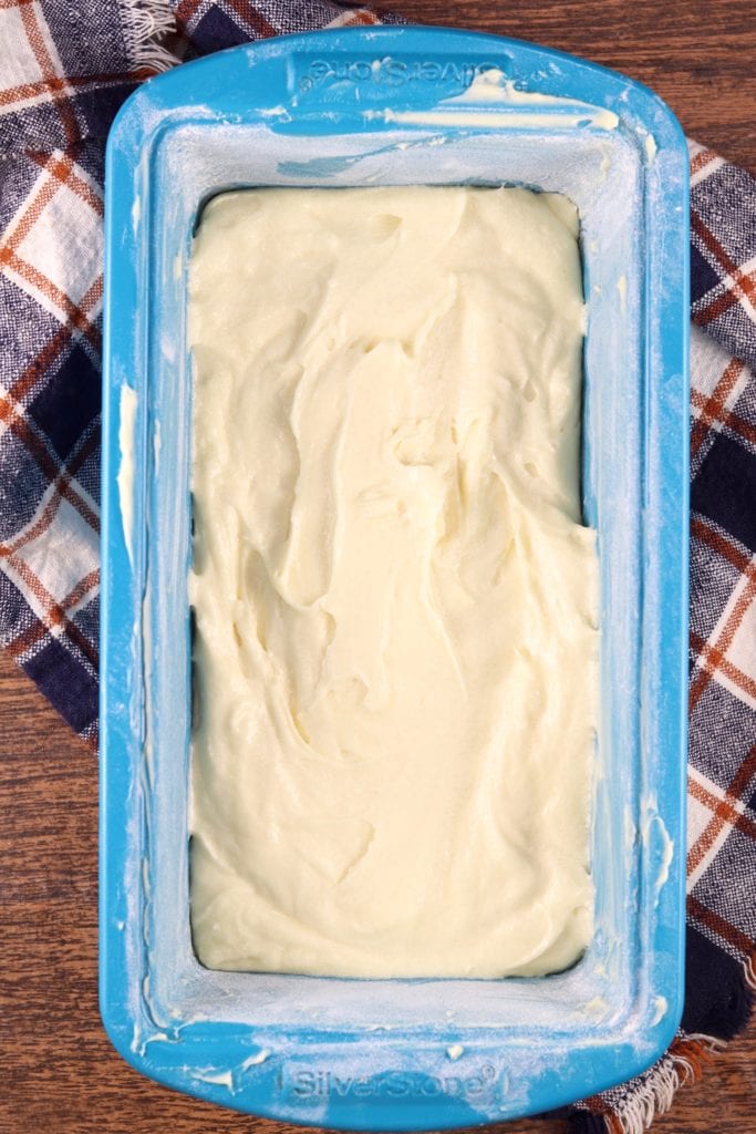 Almond Cake in blue loaf pan ready to go into oven