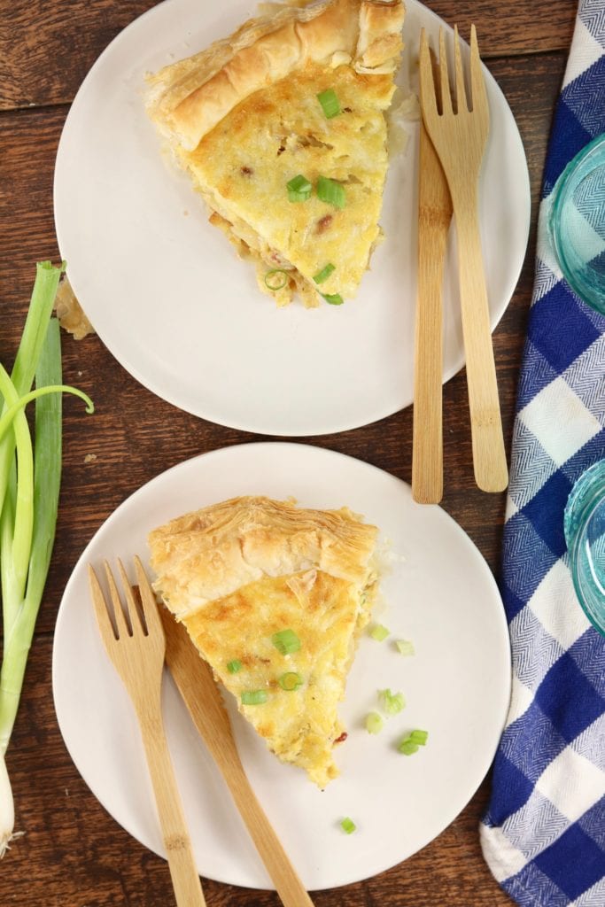 Slices of bacon and cheddar quiche
