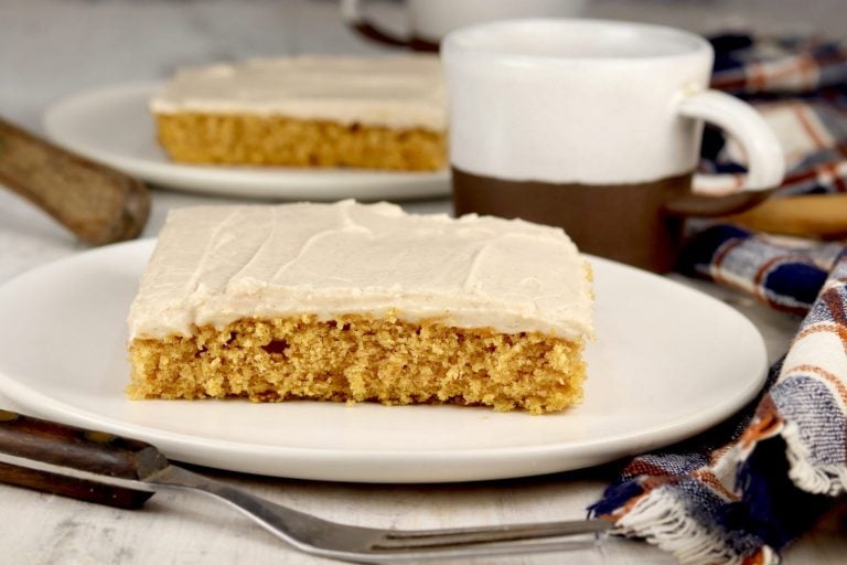 Slice of pumpkin cake and cup of coffee