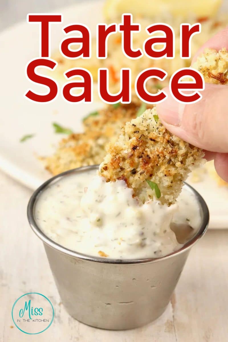 Tartar sauce with fish dipping into sauce. Text overlay.