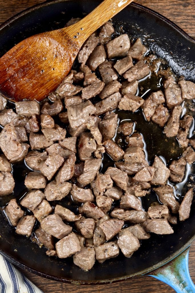 Steak browned in a skillet