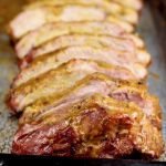 Baby Back Ribs sliced on a baking sheet