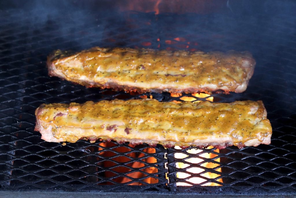 2 slabs of ribs on grill