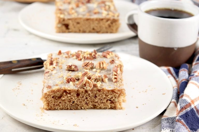 Slices of sheet cake with pecans