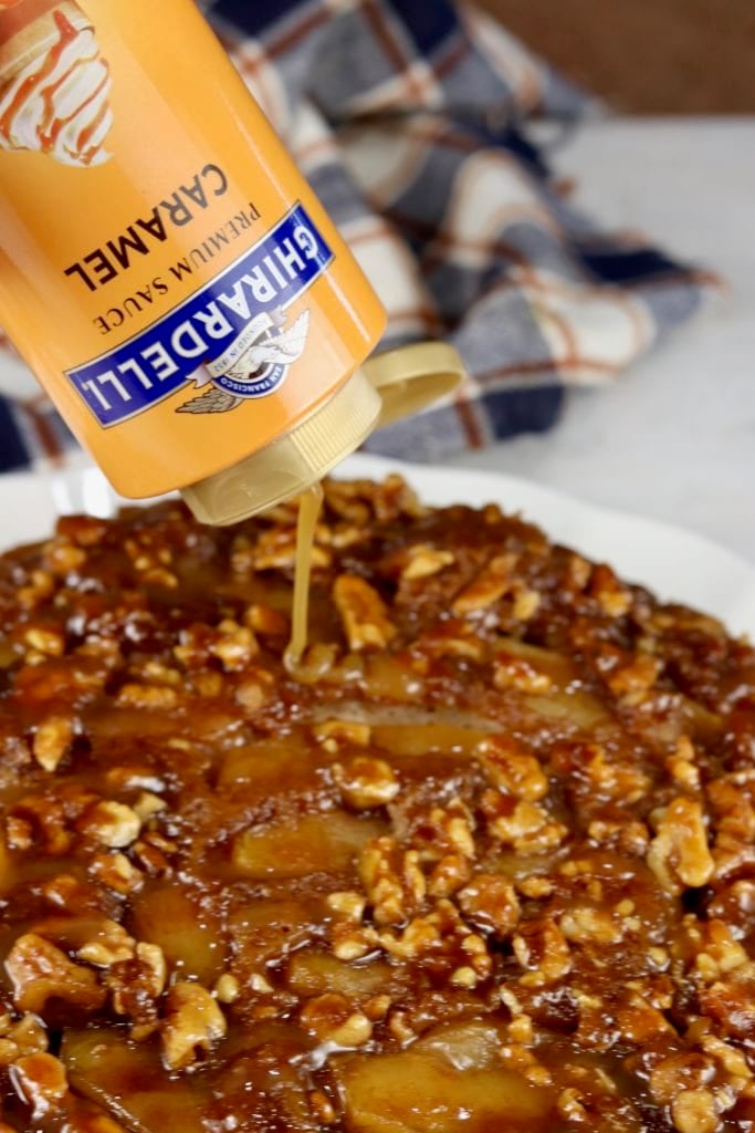 Caramel drizzling over apple cake