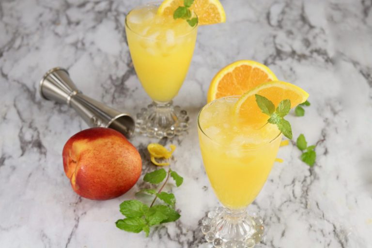 Fresh peach and orange with 2 orange juice cockgtails