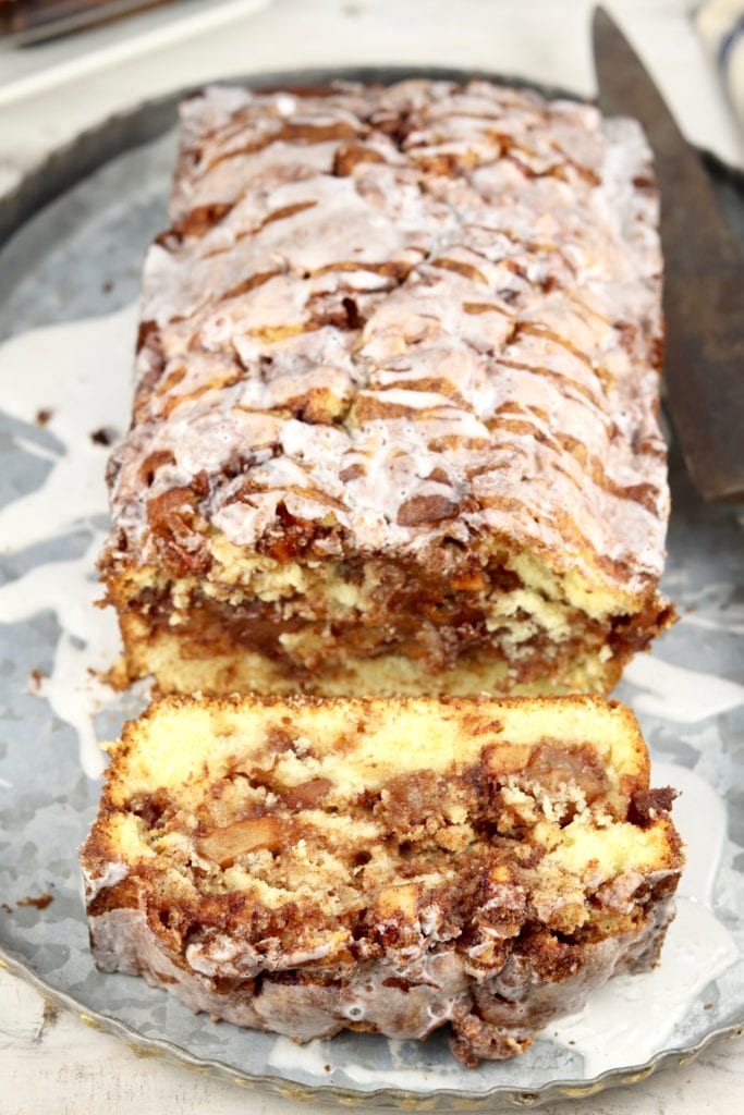 Apple fritter loaf cake with glaze. Apple Fritter Cake with icing drizzle