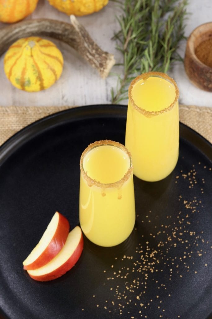 2 glasses of apple cider mimosas