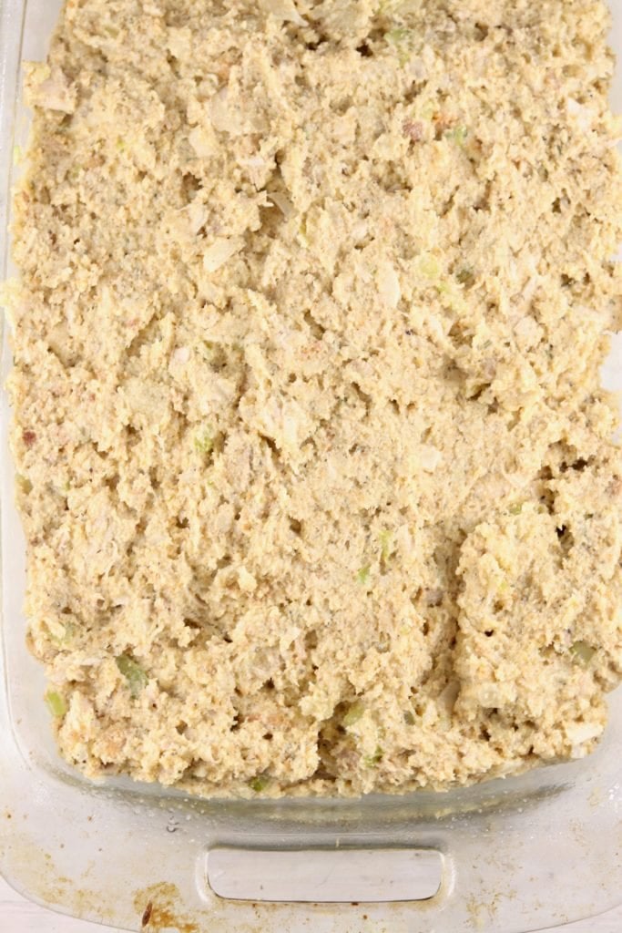 Chicken and Dressing in a baking dish ready to bake