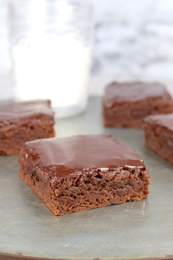 Chocolate Glazed Brownies sliced on a galvanized tray