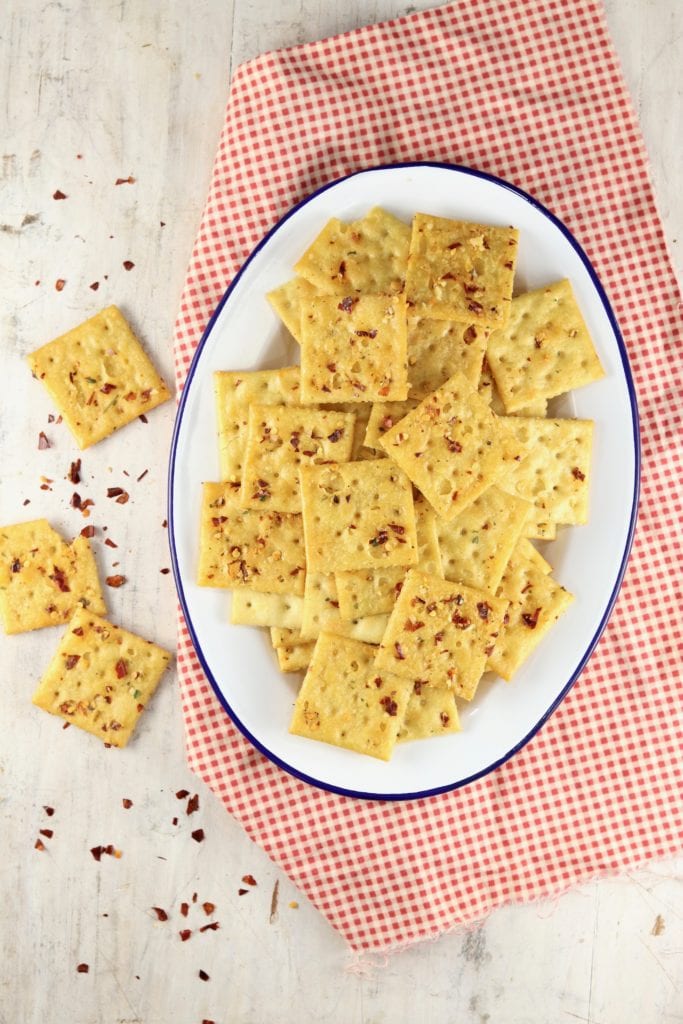 platter of saltine crackers with red pepper flakes