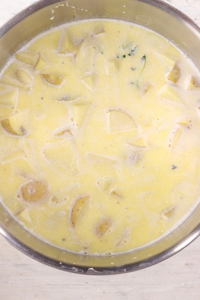 Making creamy mashed potatoes cooked in cream and butter