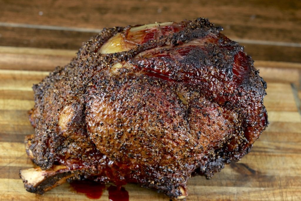 Grilled Prime Rib Roast on a cutting board