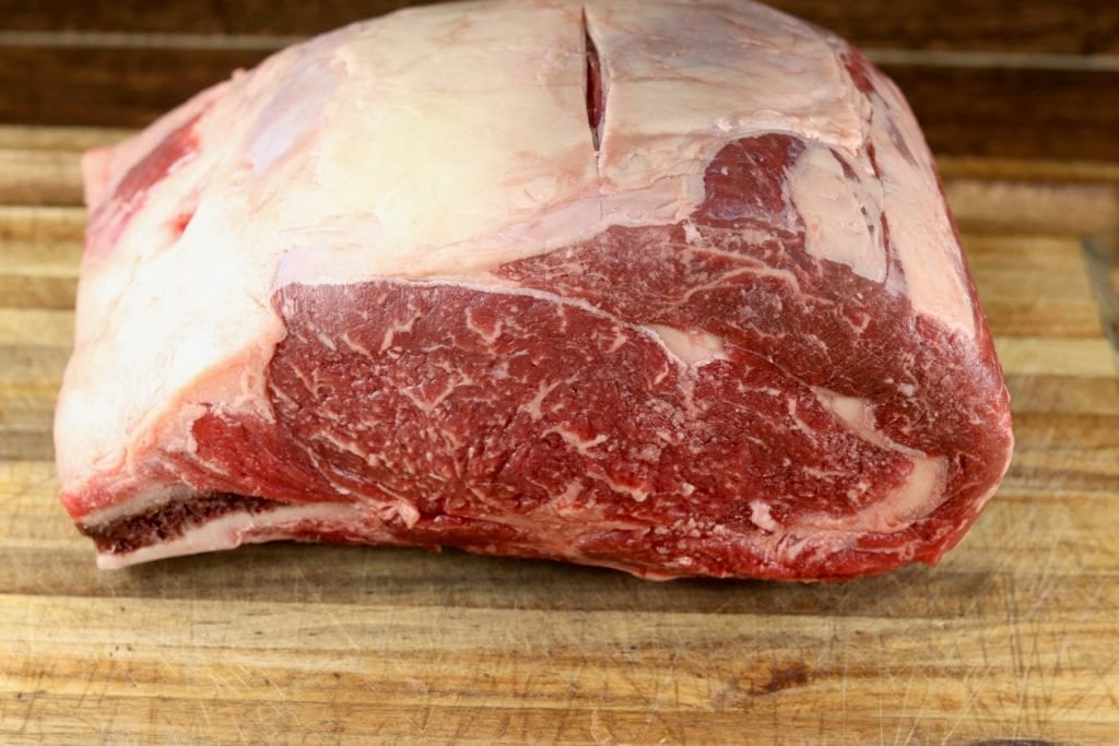 Prime Rib Roast on a cutting board - raw