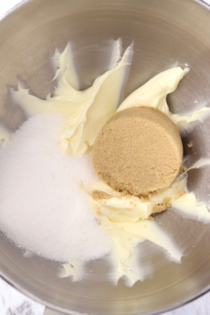 Butter and sugar in a mixing bowl for molasses cookies