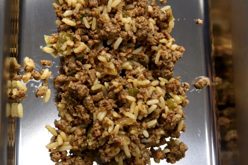 Making sausage with rice and ground pork