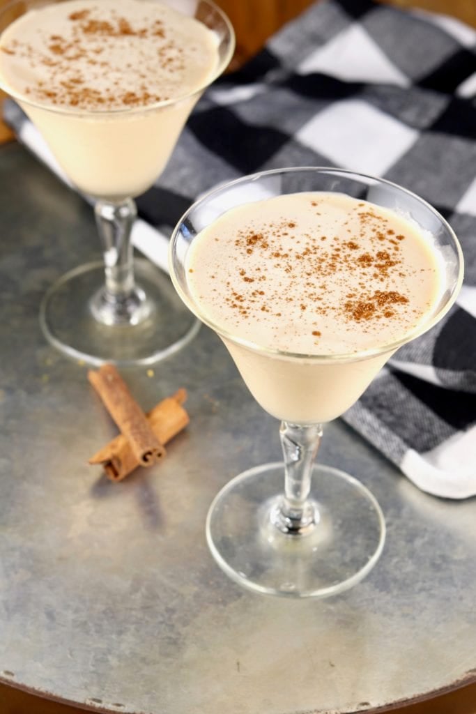 2 cocktail glasses with Brandy Alexander on a serving platter