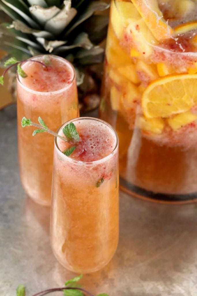 Champagne party punch recipe with fruit and mint