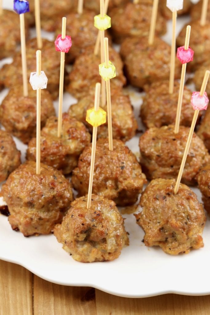 Meatball appetizers on a platter with party picks