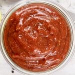 Bowl of cocktail sauce with lemon slices