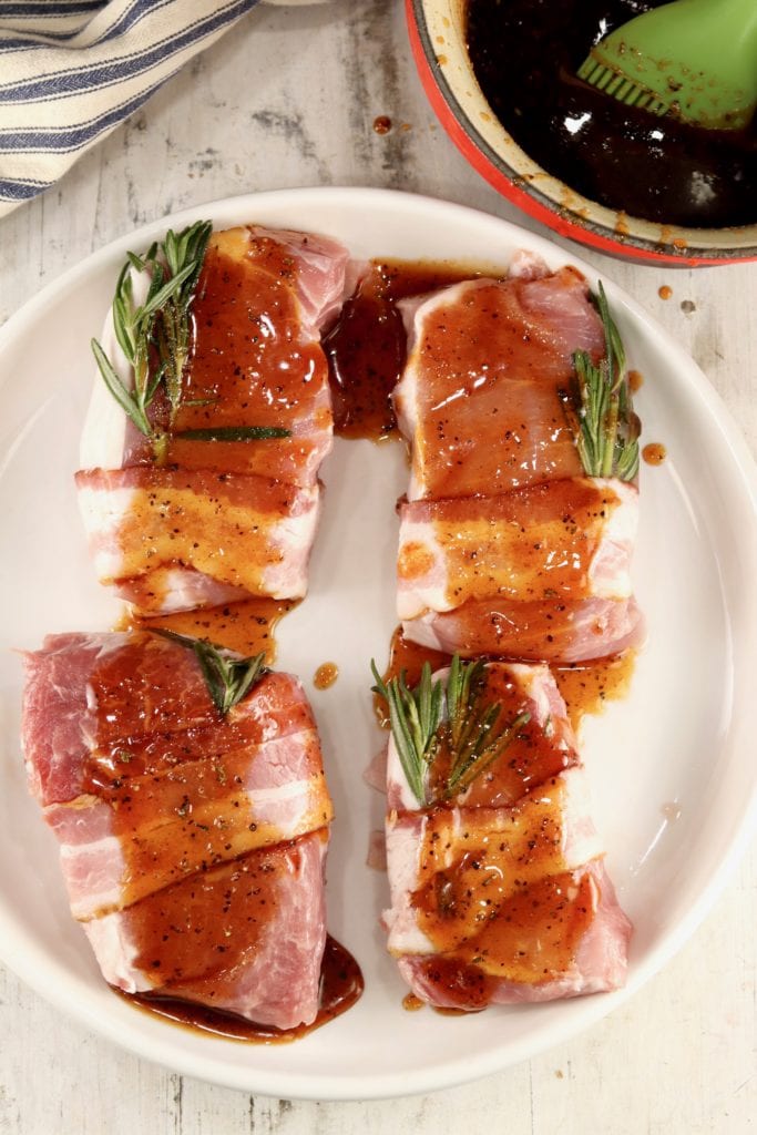 Maple glaze brushed over pork chops for grilling