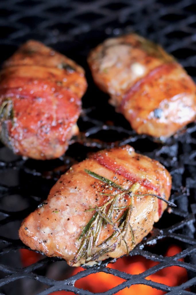 Grilled Bacon wrapped pork chops on the grill
