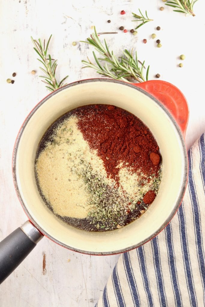spices in a saucepan with maple syrup for pork glaze