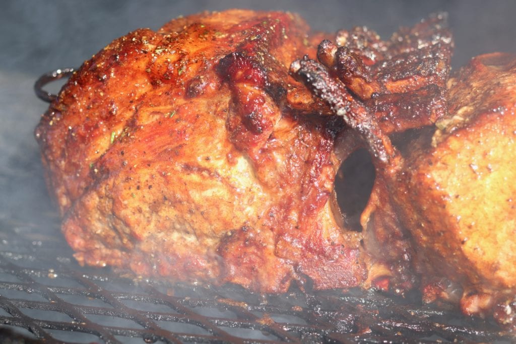 Smoked and grilled pork rib roast on the grill