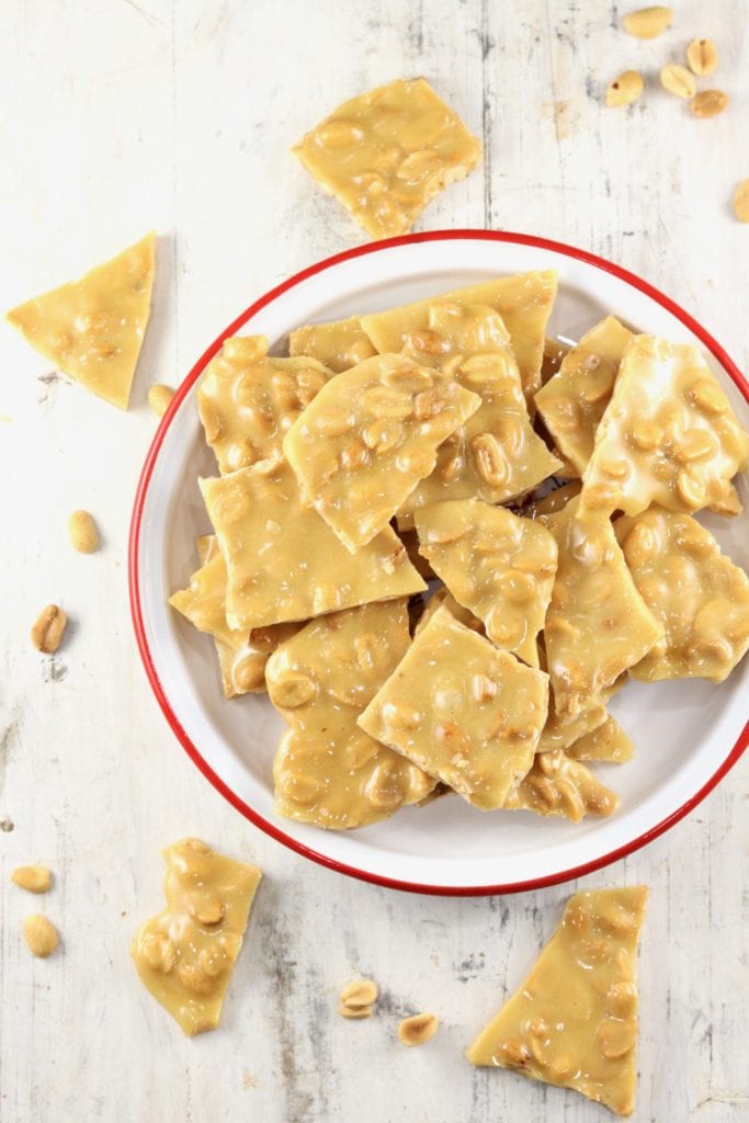 White board with peanut brittle candy pieces