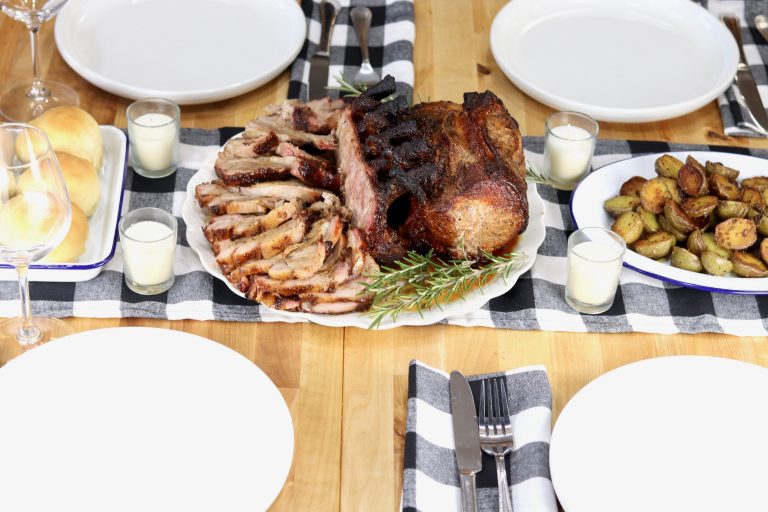 Table setting with pork rib roast