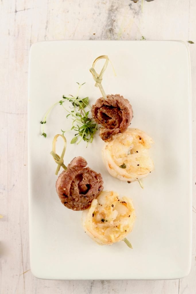 Rolled steak bites with shrimp on a toothpick